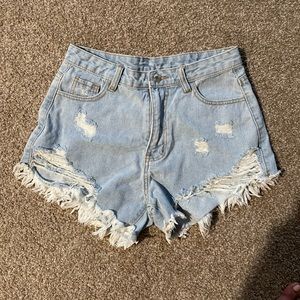 Light wash ripped jean shorts